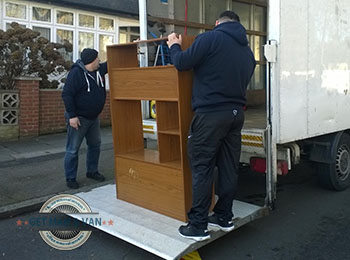 Movers loading furniture